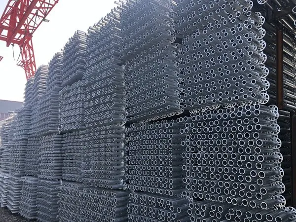 Bundled hot-dip galvanized ringlock standards in the yard